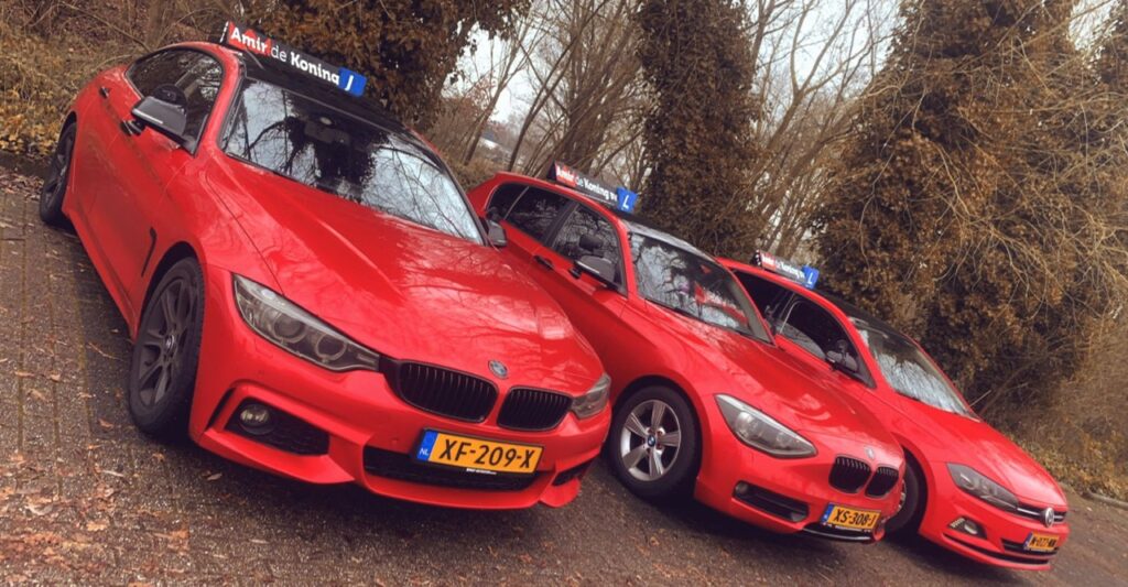 Amir de Koning autorijschool logo