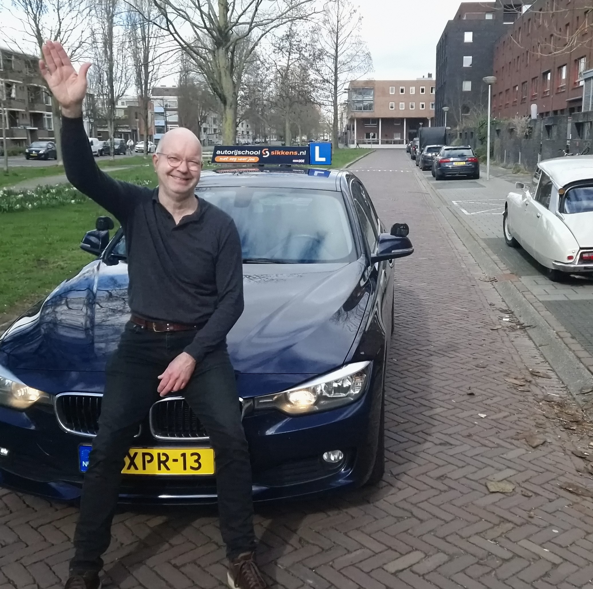 Autorijschool Sikkens logo